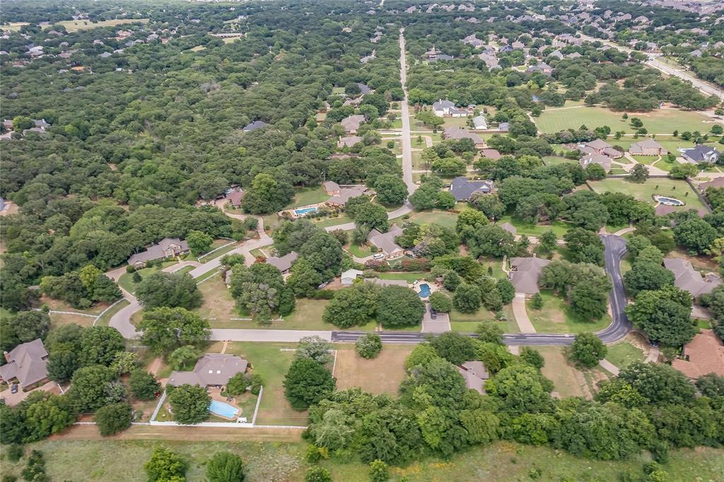 4001 Curry Road Arlington, TX 76001 - Photo 30 of 31 an aerial view of residential houses with outdoor space and trees