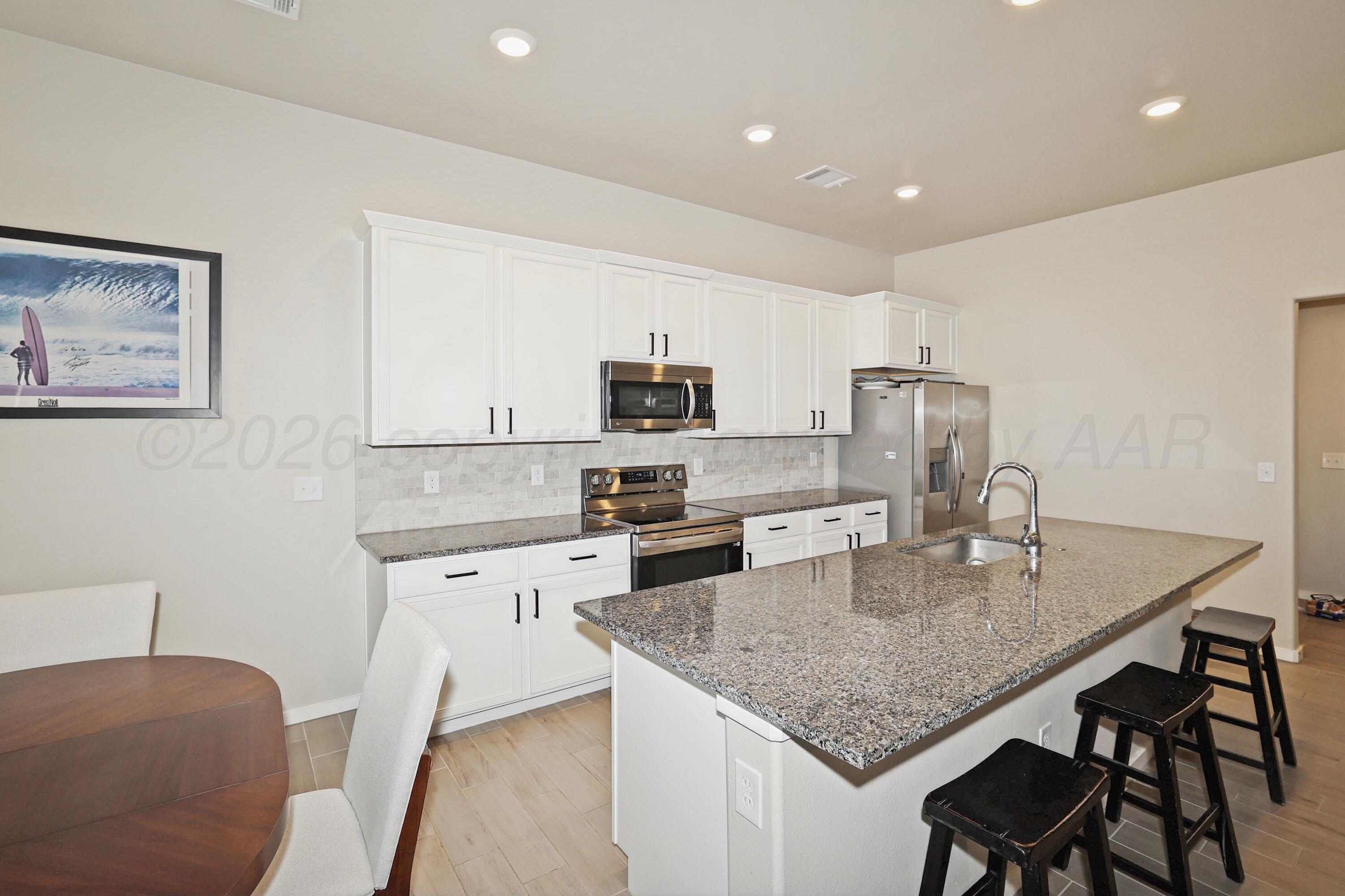 7811 Bellamy Drive Amarillo, TX 79119 - Photo 12 of 23 7-Kitchen