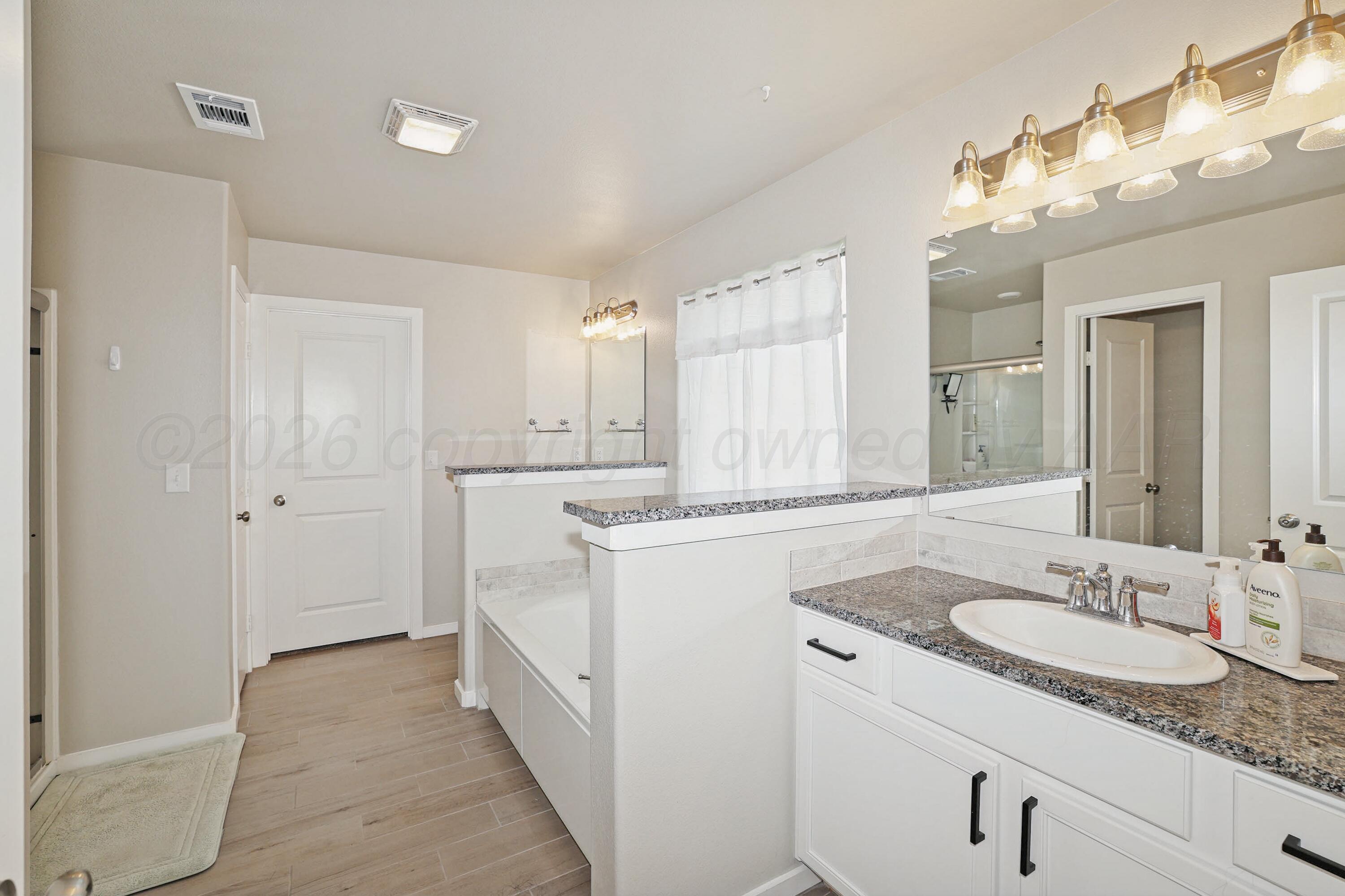 7811 Bellamy Drive Amarillo, TX 79119 - Photo 16 of 23 11-Primary Bath