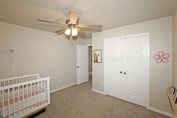 a view of a workspace with furniture