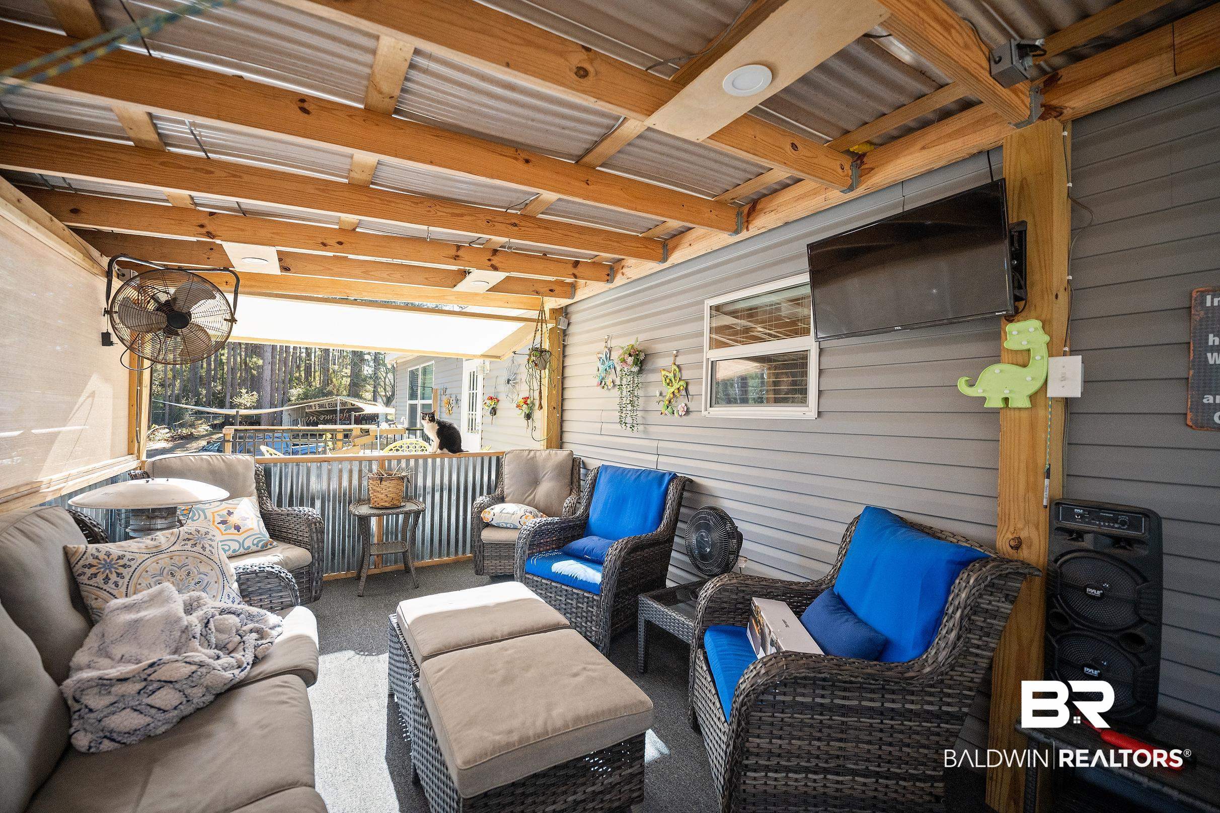 8630 Allison Lane Wilmer, AL 36587 - Photo 24 of 31 View of patio / terrace with an outdoor hangout area
