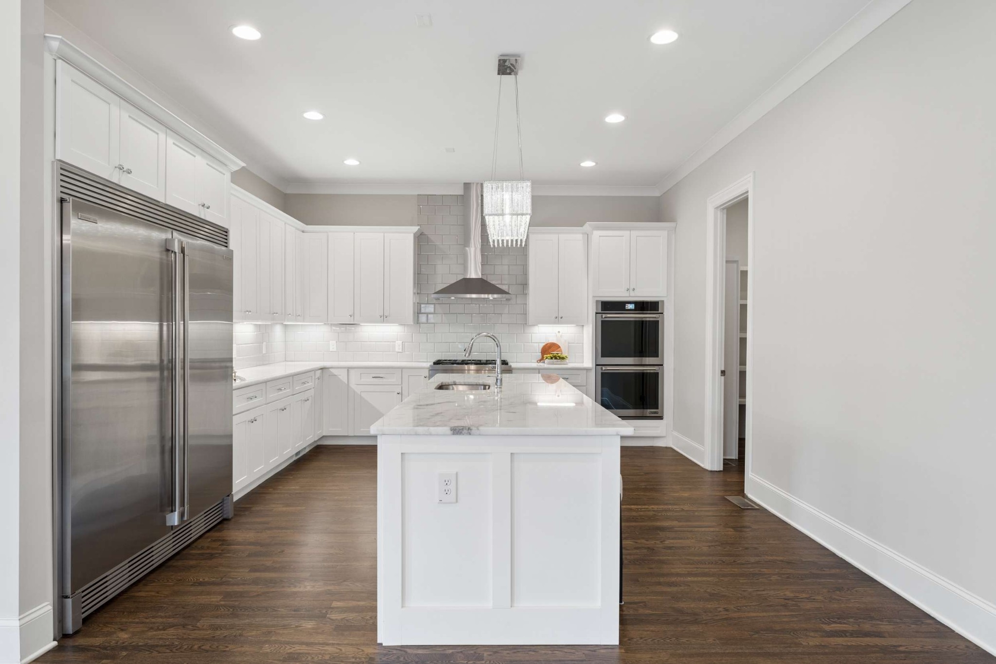 3705 B Estes Road Nashville, TN 37215 - Photo 11 of 61 a large kitchen with kitchen island a sink stainless steel appliances and cabinets