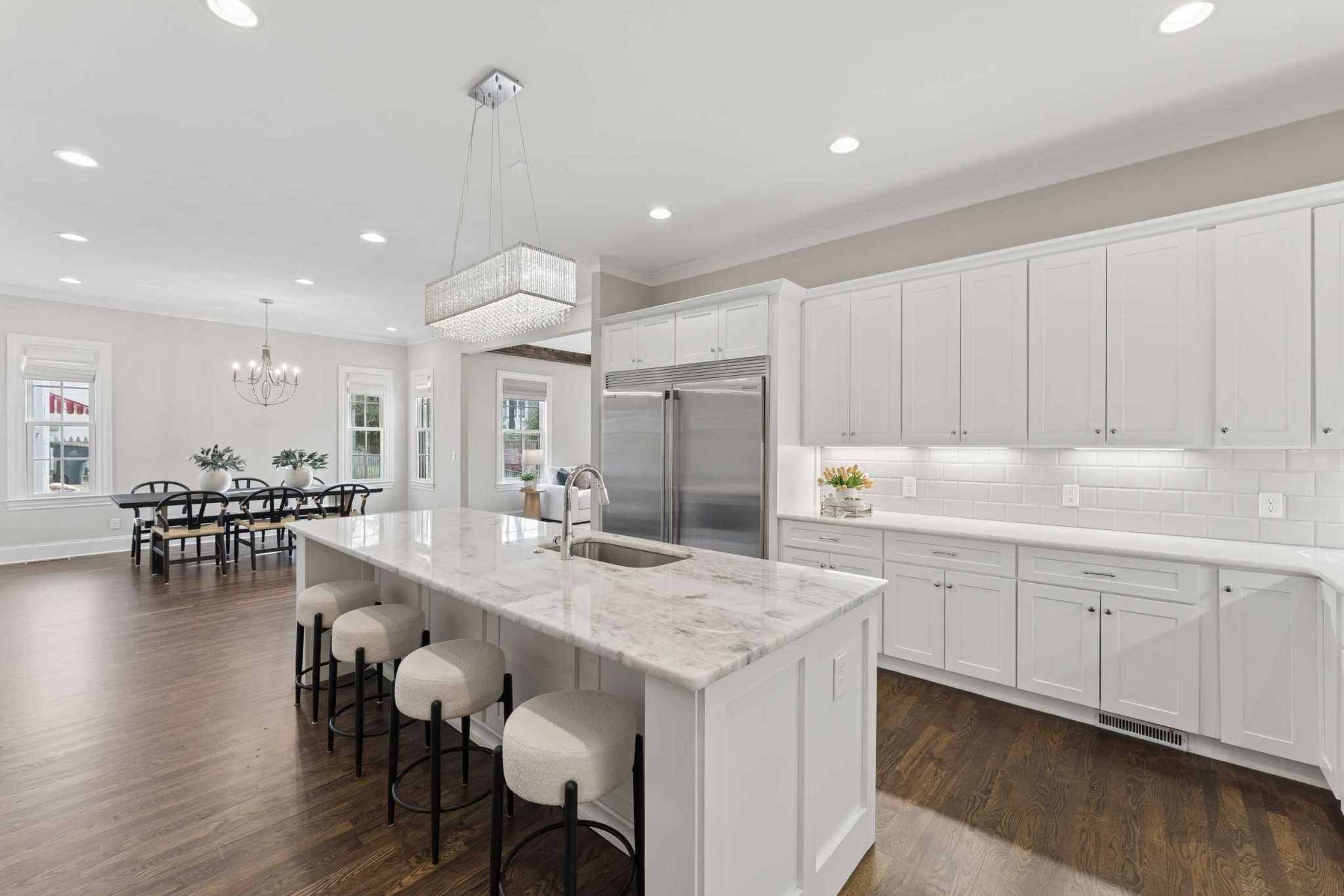 3705 B Estes Road Nashville, TN 37215 - Photo 14 of 61 a kitchen with center island table and chairs in it