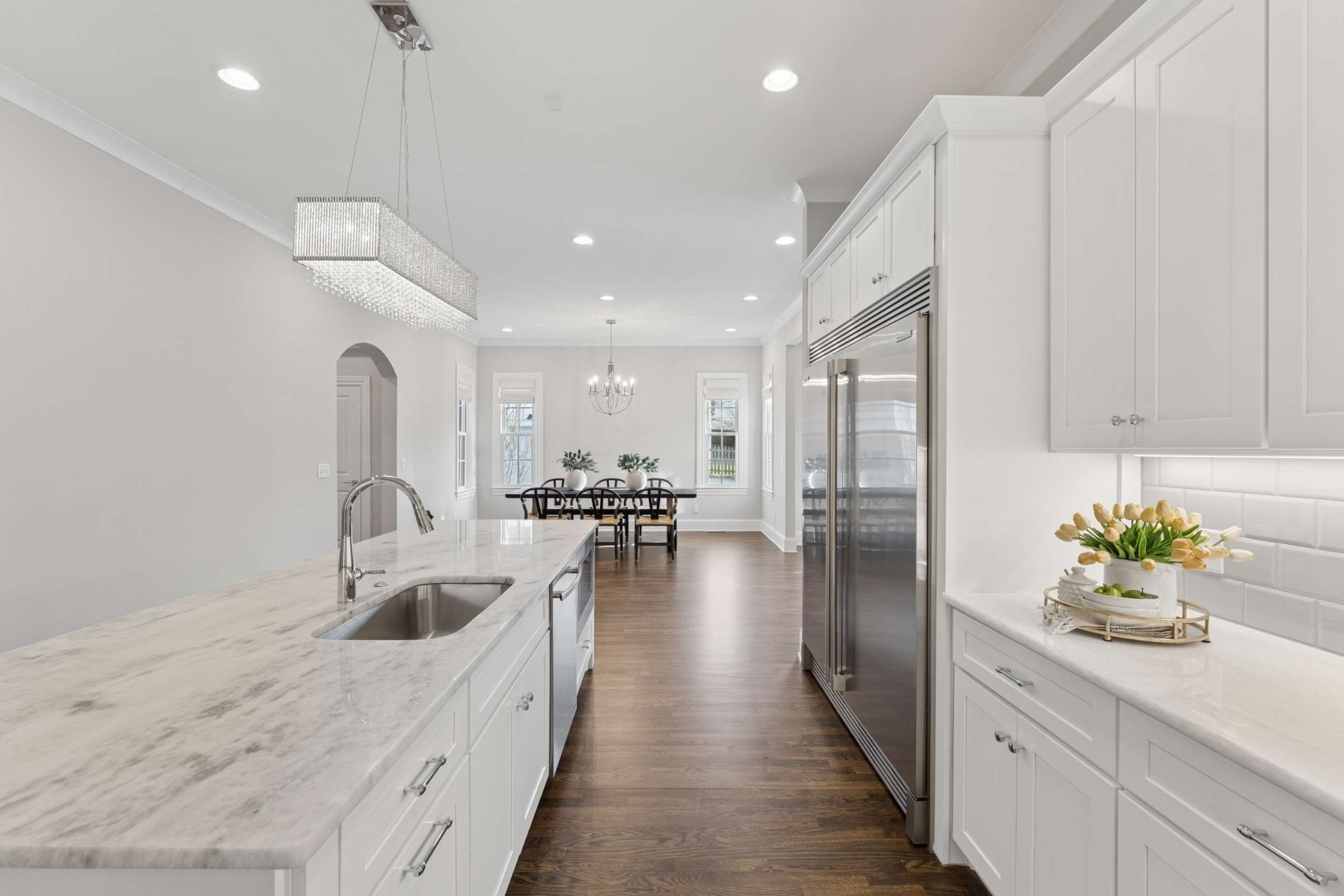 3705 B Estes Road Nashville, TN 37215 - Photo 16 of 61 a kitchen with sink cabinets and wooden floor