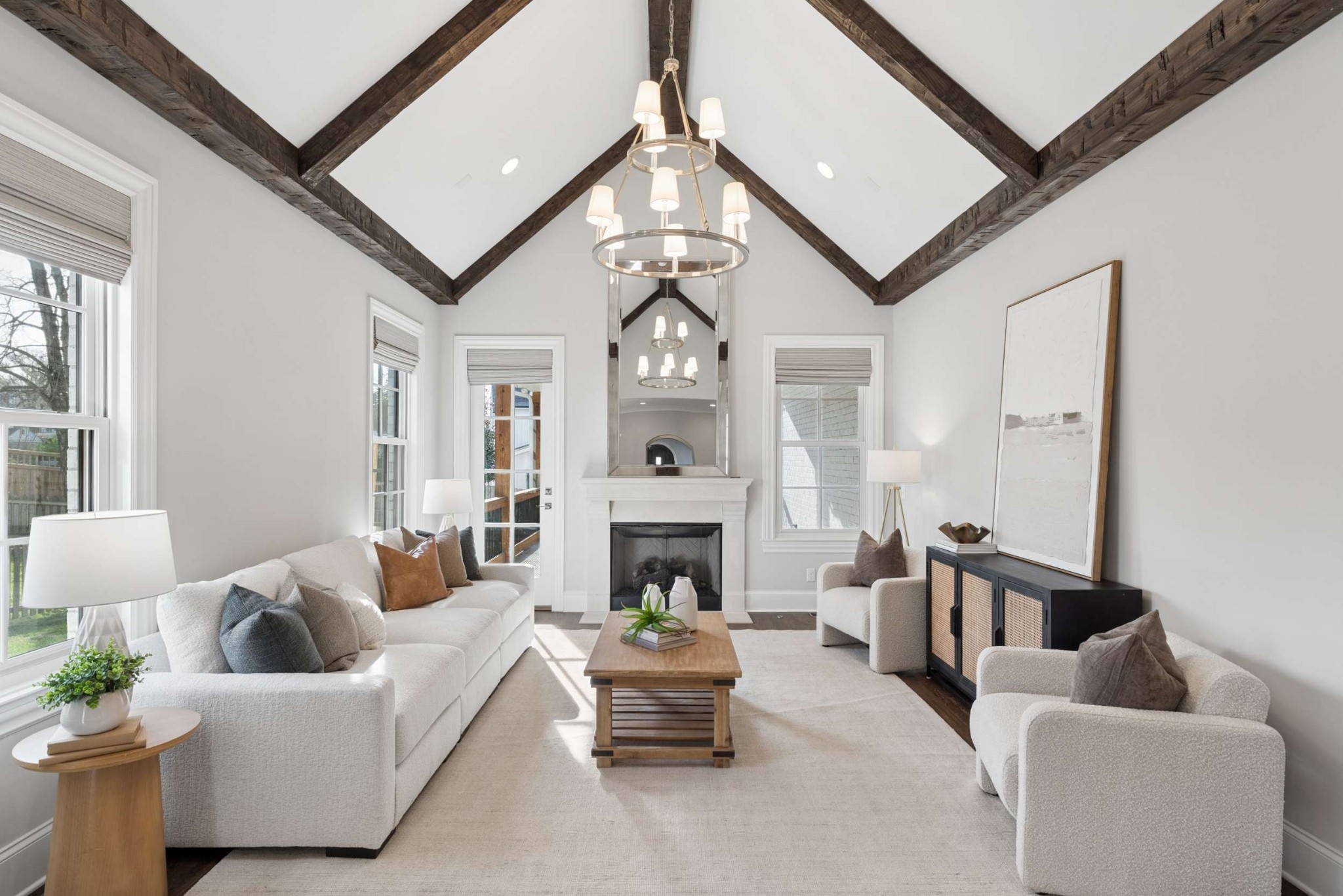 3705 B Estes Road Nashville, TN 37215 - Photo 19 of 61 a living room with furniture a fireplace and a chandelier