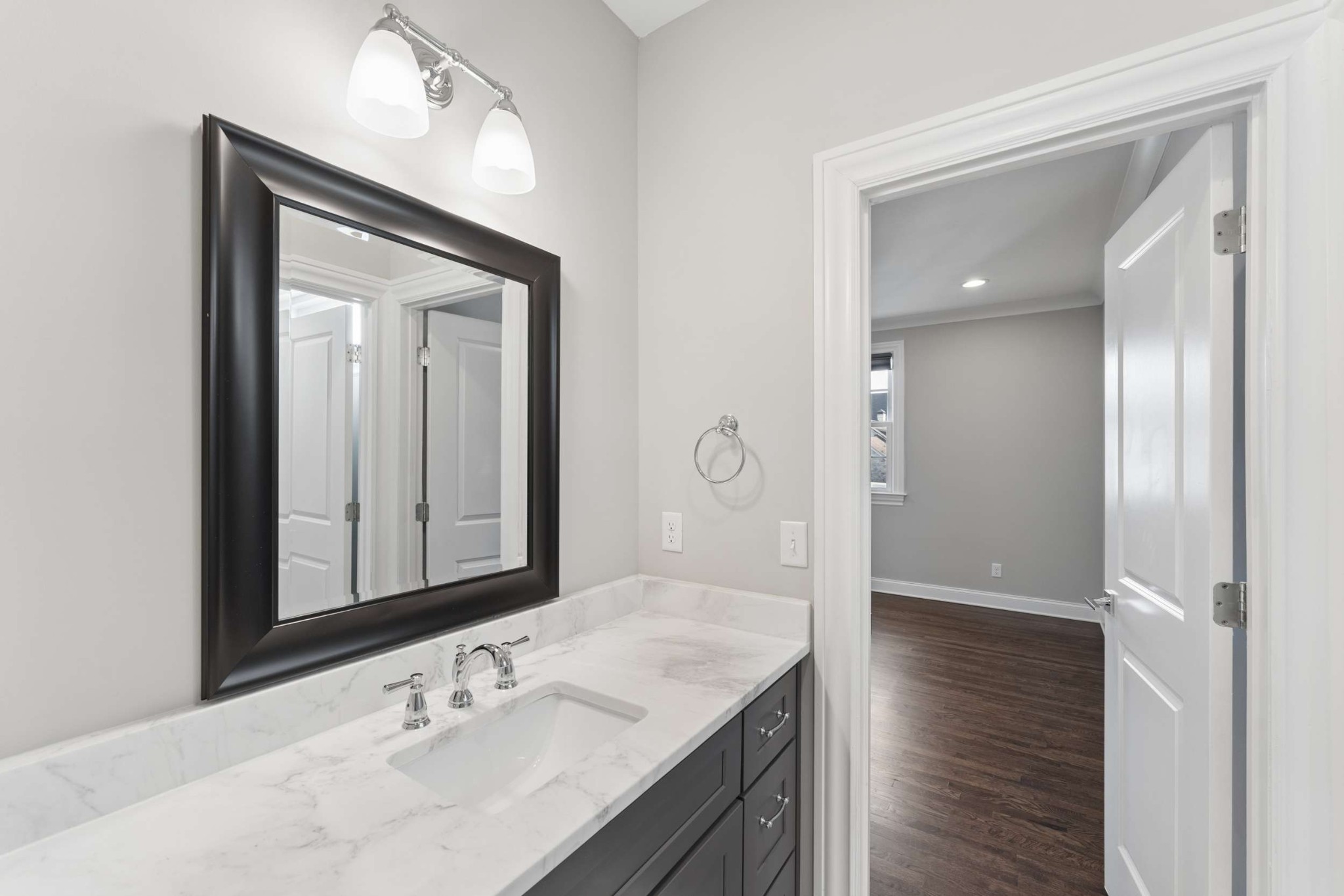 3705 B Estes Road Nashville, TN 37215 - Photo 45 of 61 a bathroom with a sink vanity and a mirror