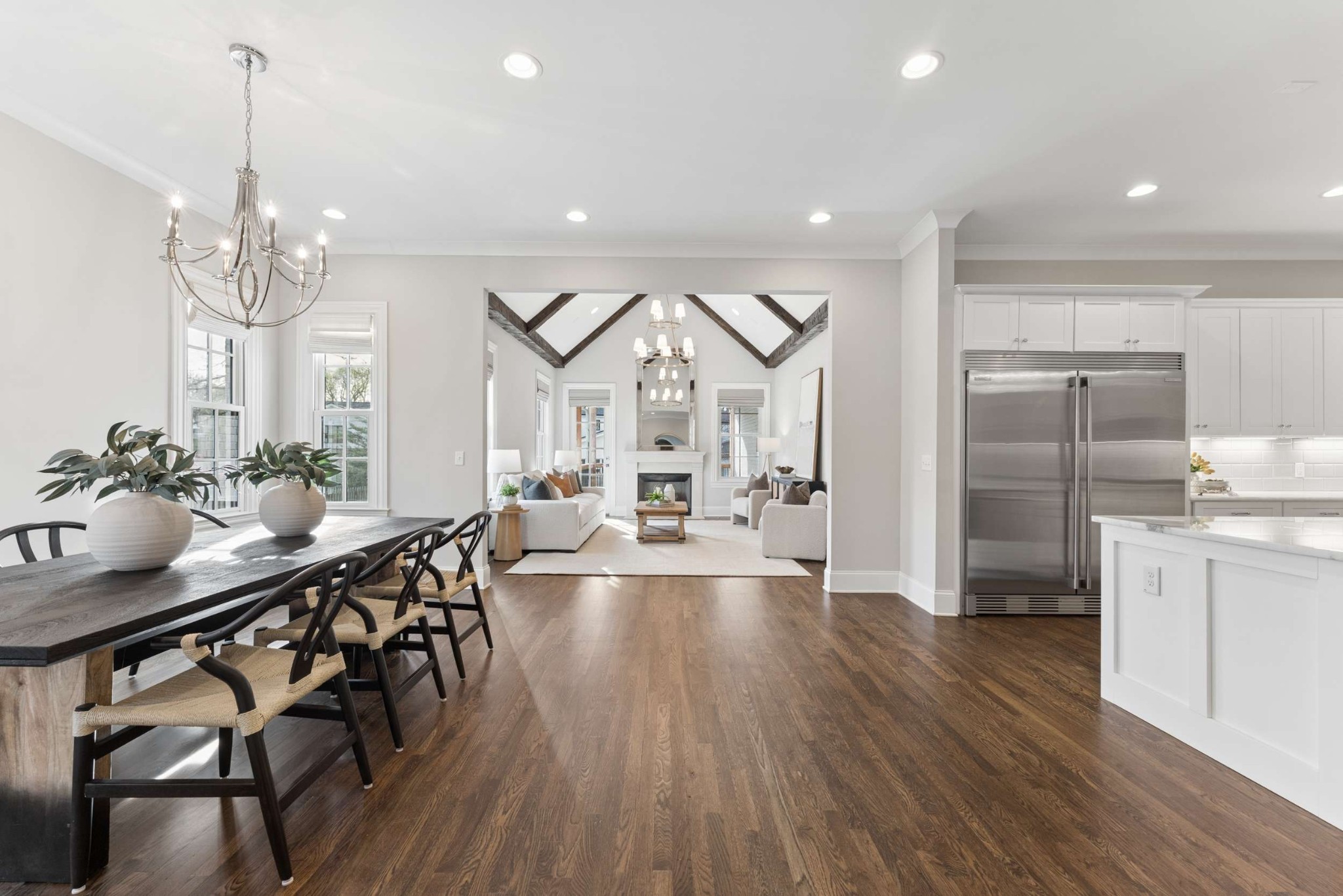 3705 B Estes Road Nashville, TN 37215 - Photo 7 of 61 a view of a dining room and livingroom with furniture wooden floor a chandelier