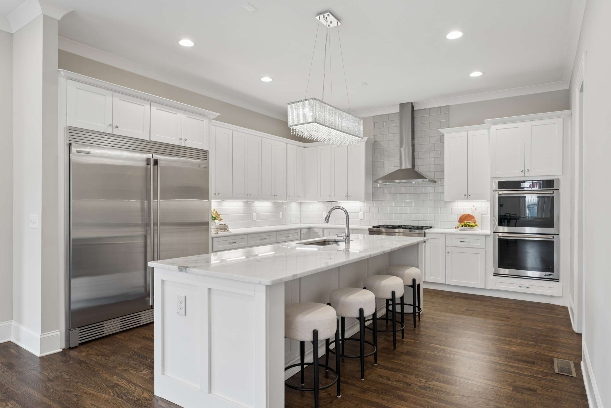 3705 B Estes Road Nashville, TN 37215 - Photo 10 of 61 a kitchen with kitchen island a refrigerator and a stove top oven