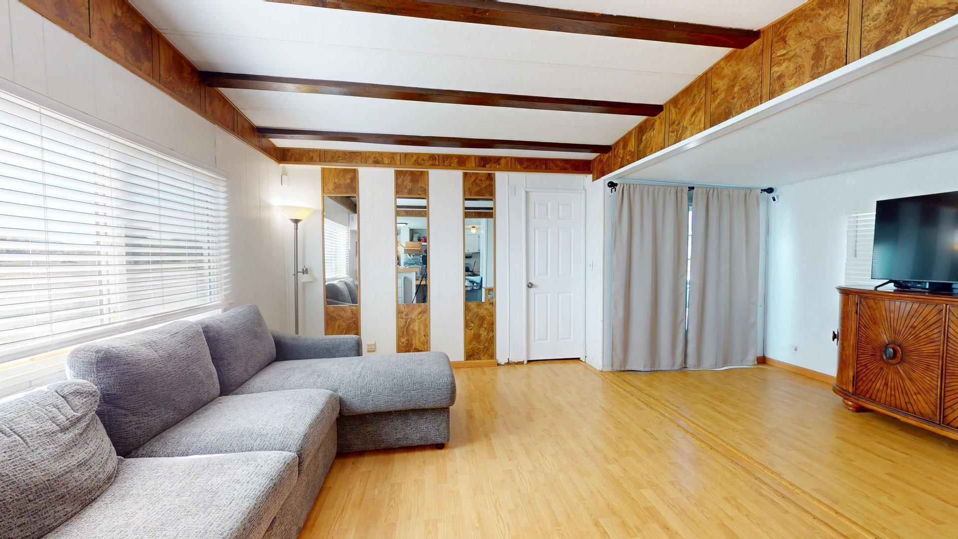 57775 Junipero Trail Yucca Valley, CA 92284 - Photo 6 of 19 a bedroom with furniture and a window