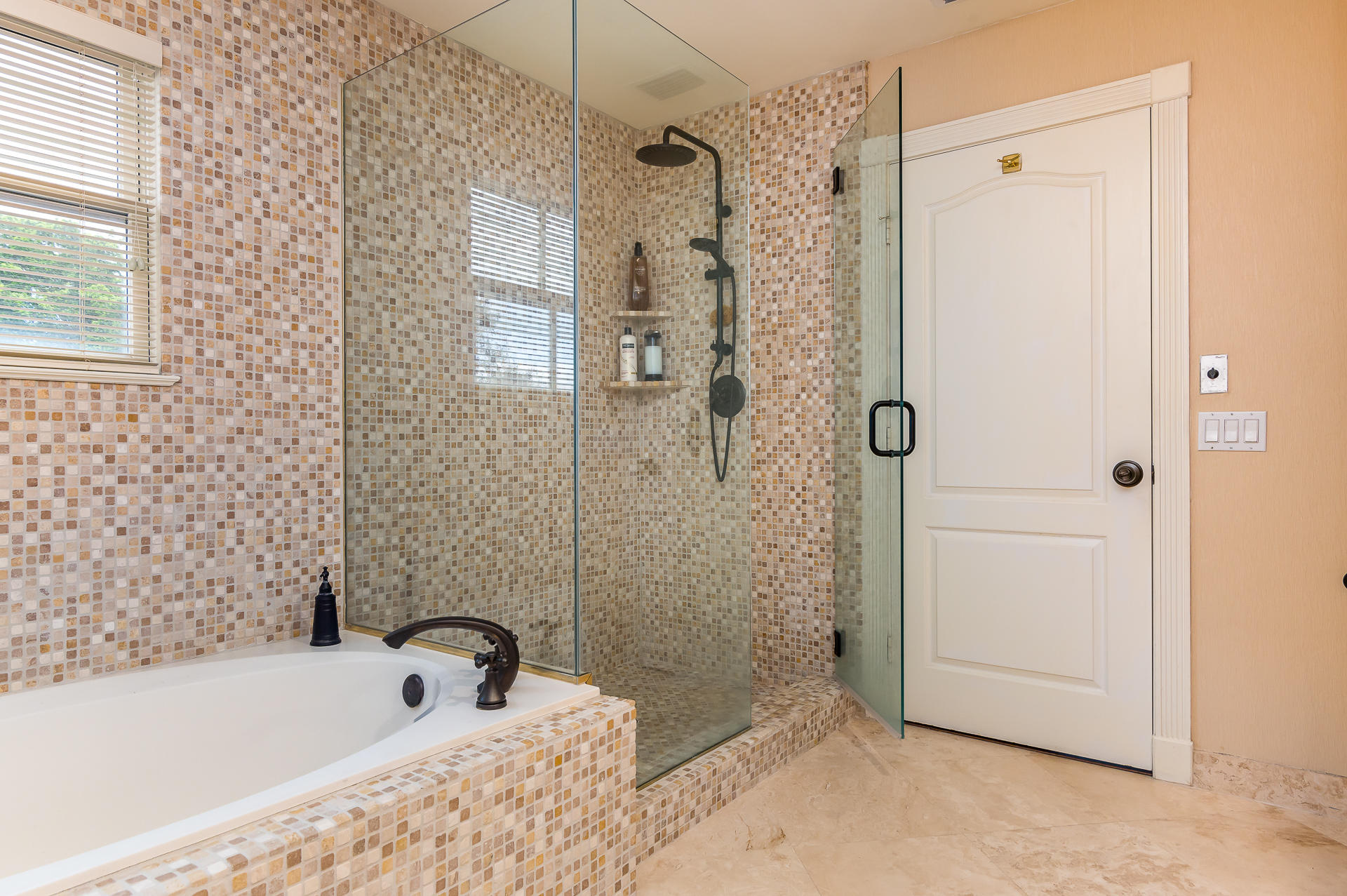 3903 Northwest 58th Street, Unit 38 Boca Raton, FL 33496 - Photo 17 of 30 a bathroom with a bathtub and a shower