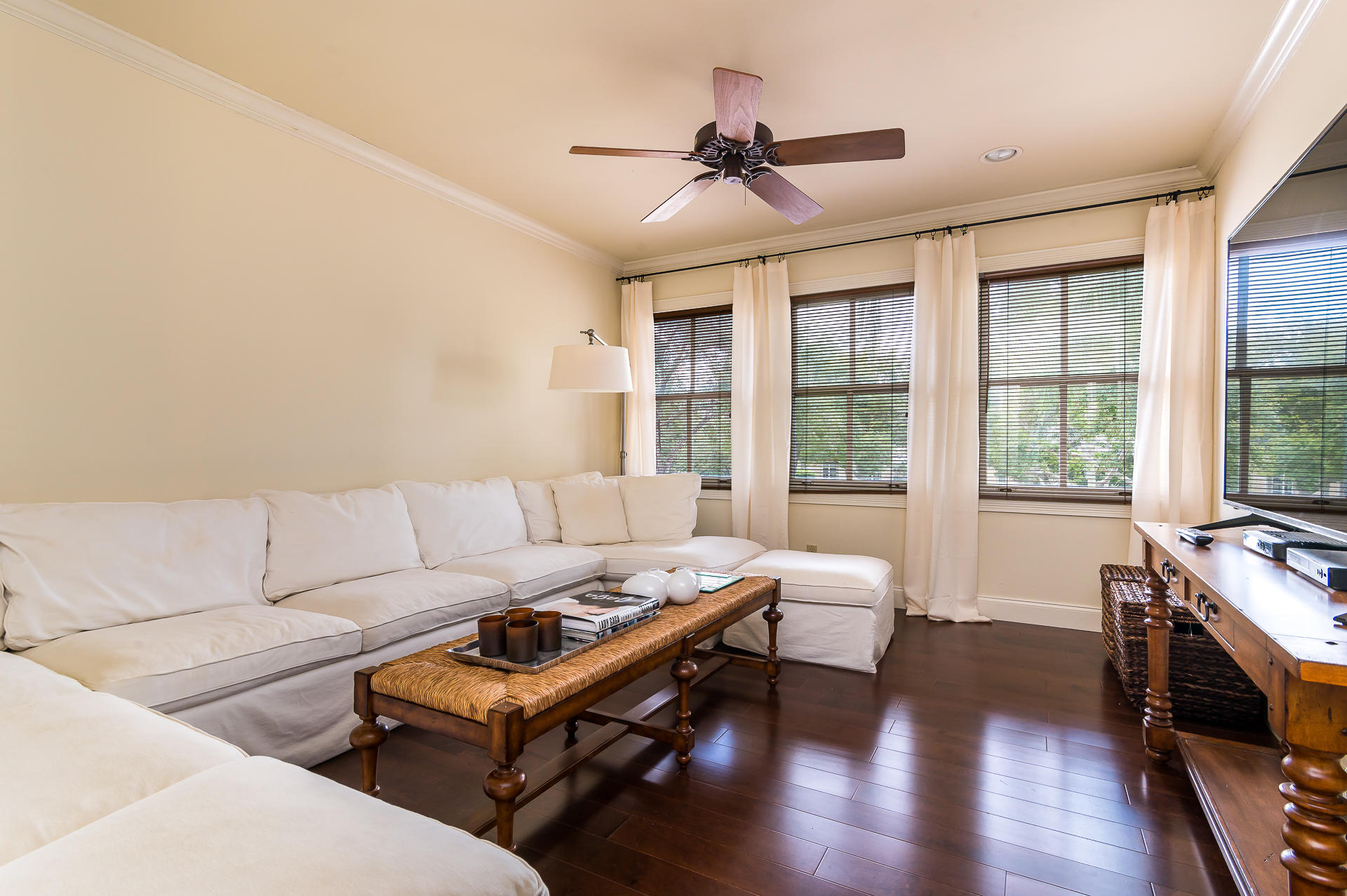 3903 Northwest 58th Street, Unit 38 Boca Raton, FL 33496 - Photo 20 of 30 a living room with furniture and wooden floor