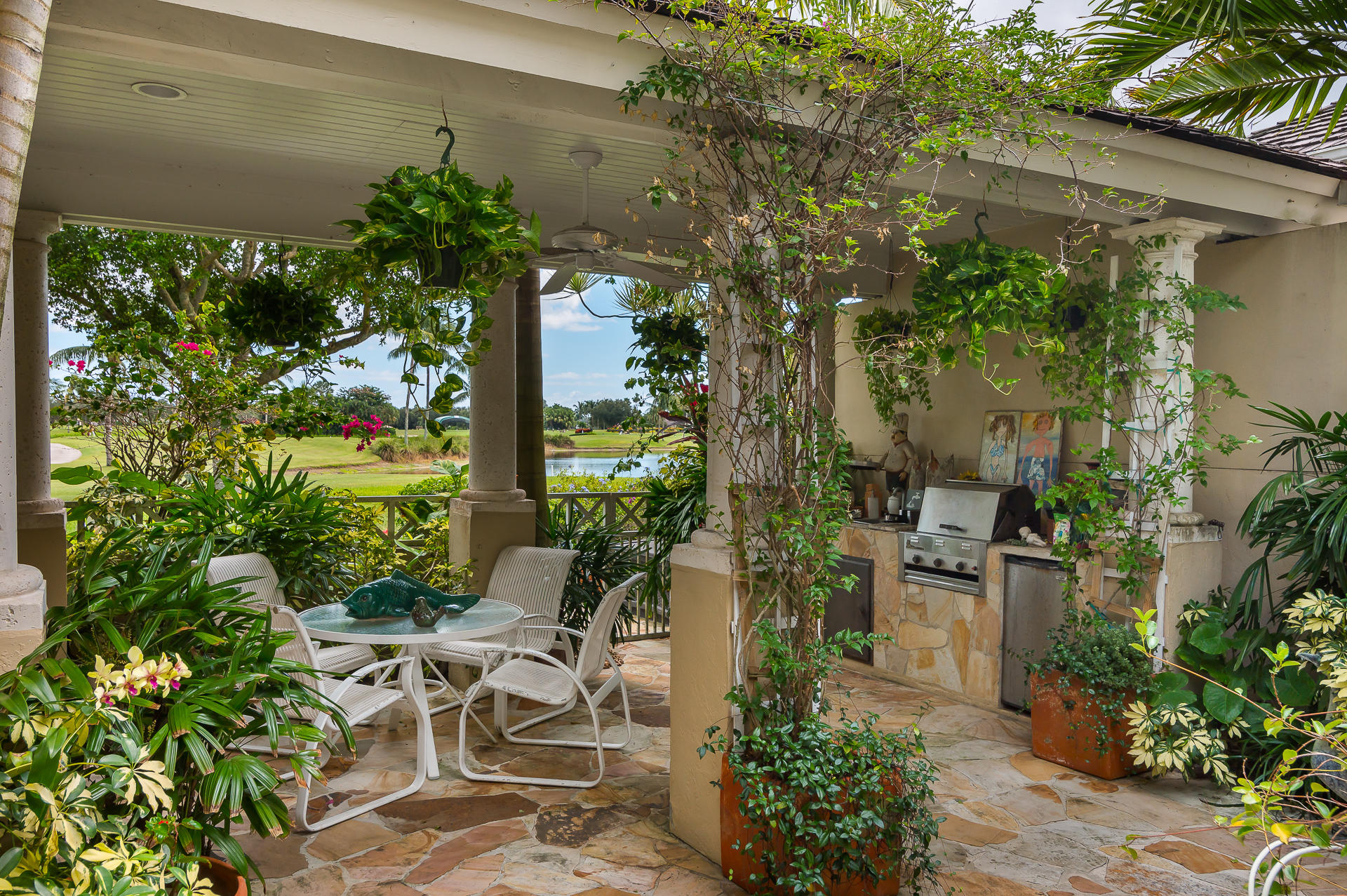 3903 Northwest 58th Street, Unit 38 Boca Raton, FL 33496 - Photo 27 of 30 a view of yard with patio