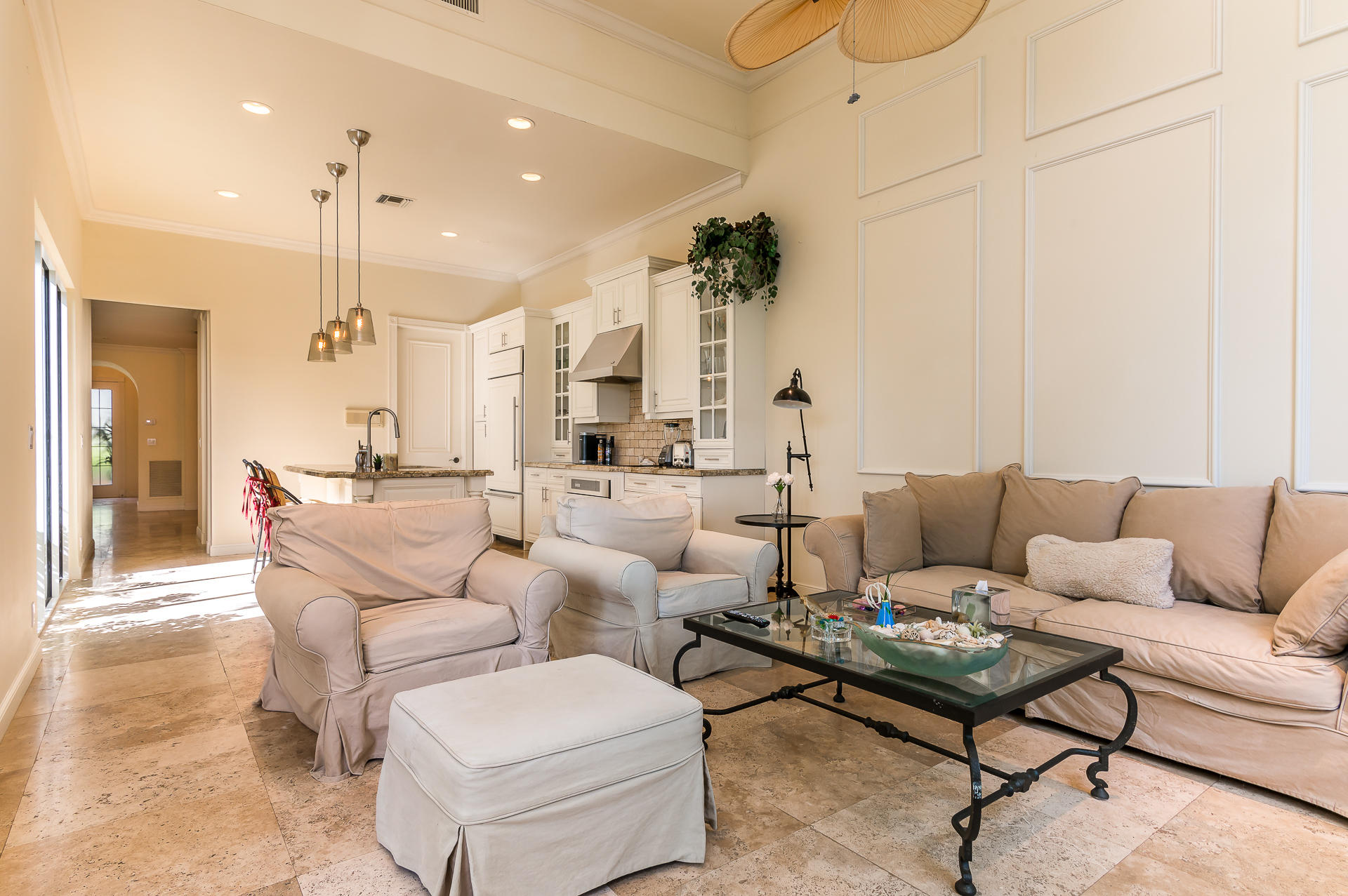 3903 Northwest 58th Street, Unit 38 Boca Raton, FL 33496 - Photo 5 of 30 a living room with furniture and a chandelier