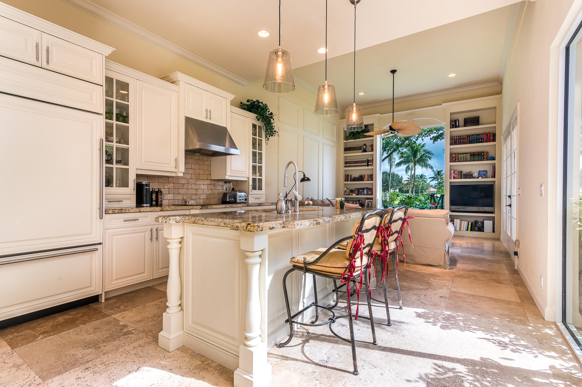 3903 Northwest 58th Street, Unit 38 Boca Raton, FL 33496 - Photo 9 of 30 a dining table chairs and a kitchen view