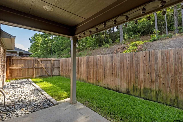 a view of a backyard with a garden