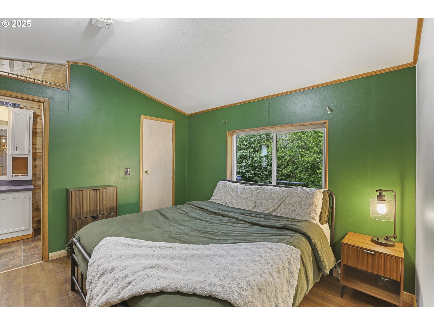 26748 Wonderly Road Rainier, OR 97048 - Photo 14 of 27 a bedroom with a bed and a window
