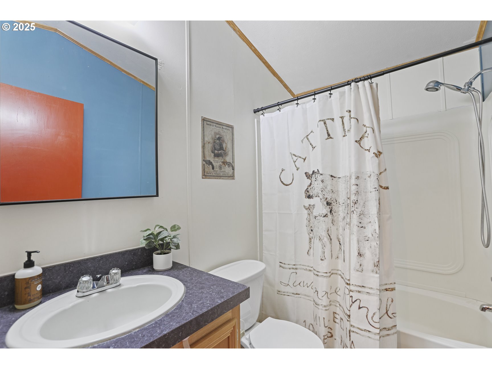 26748 Wonderly Road Rainier, OR 97048 - Photo 19 of 27 a bathroom with a sink and a mirror