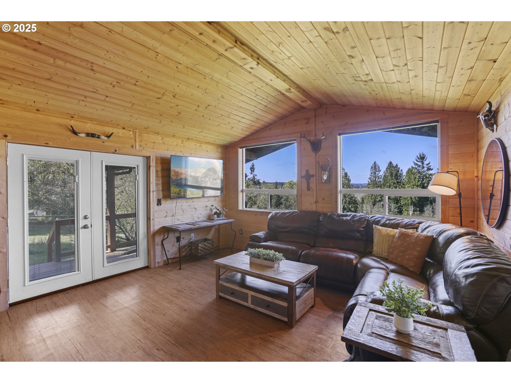 26748 Wonderly Road Rainier, OR 97048 - Photo 5 of 27 a living room with furniture and a large window