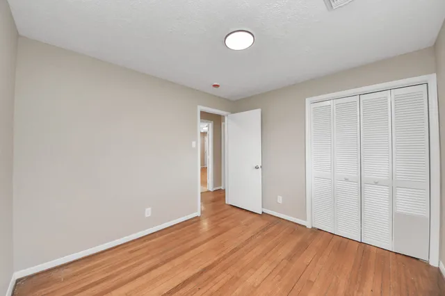 a view of a hallway with front door