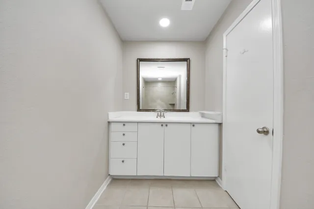 a bathroom with a toilet and a bathtub
