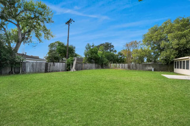 a view of a backyard with a garden