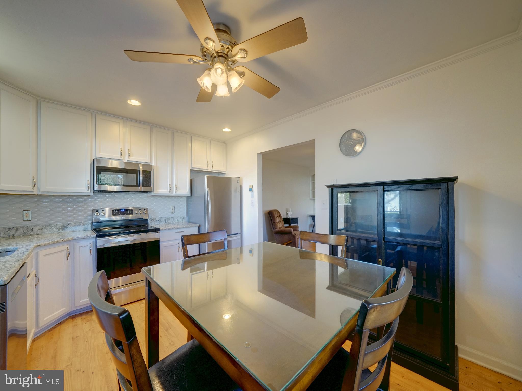 7819 Appletree Road Pasadena, MD 21122 - Photo 13 of 59 Bright and inviting kitchen space.