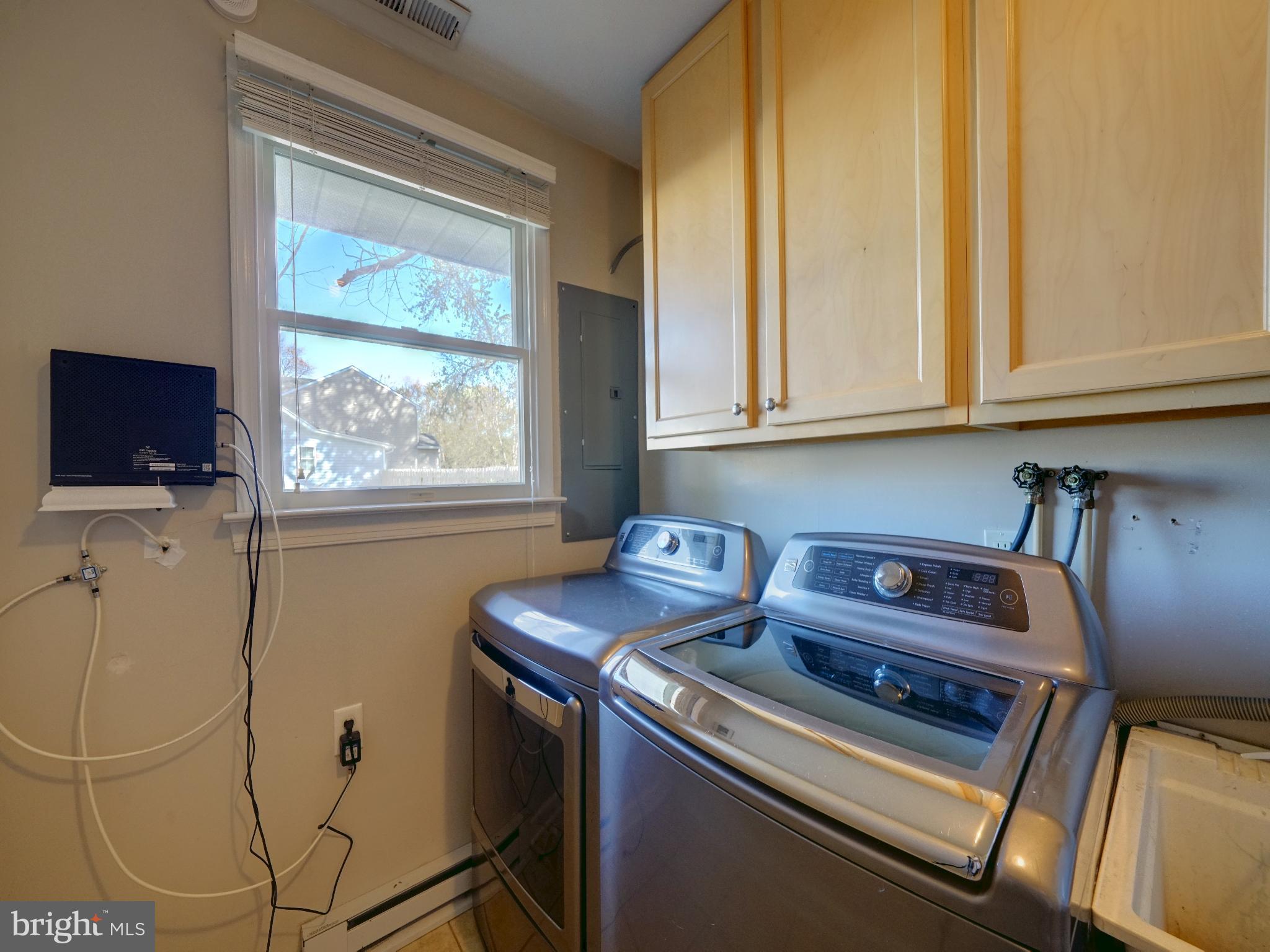 7819 Appletree Road Pasadena, MD 21122 - Photo 17 of 59 Bright and functional laundry space.