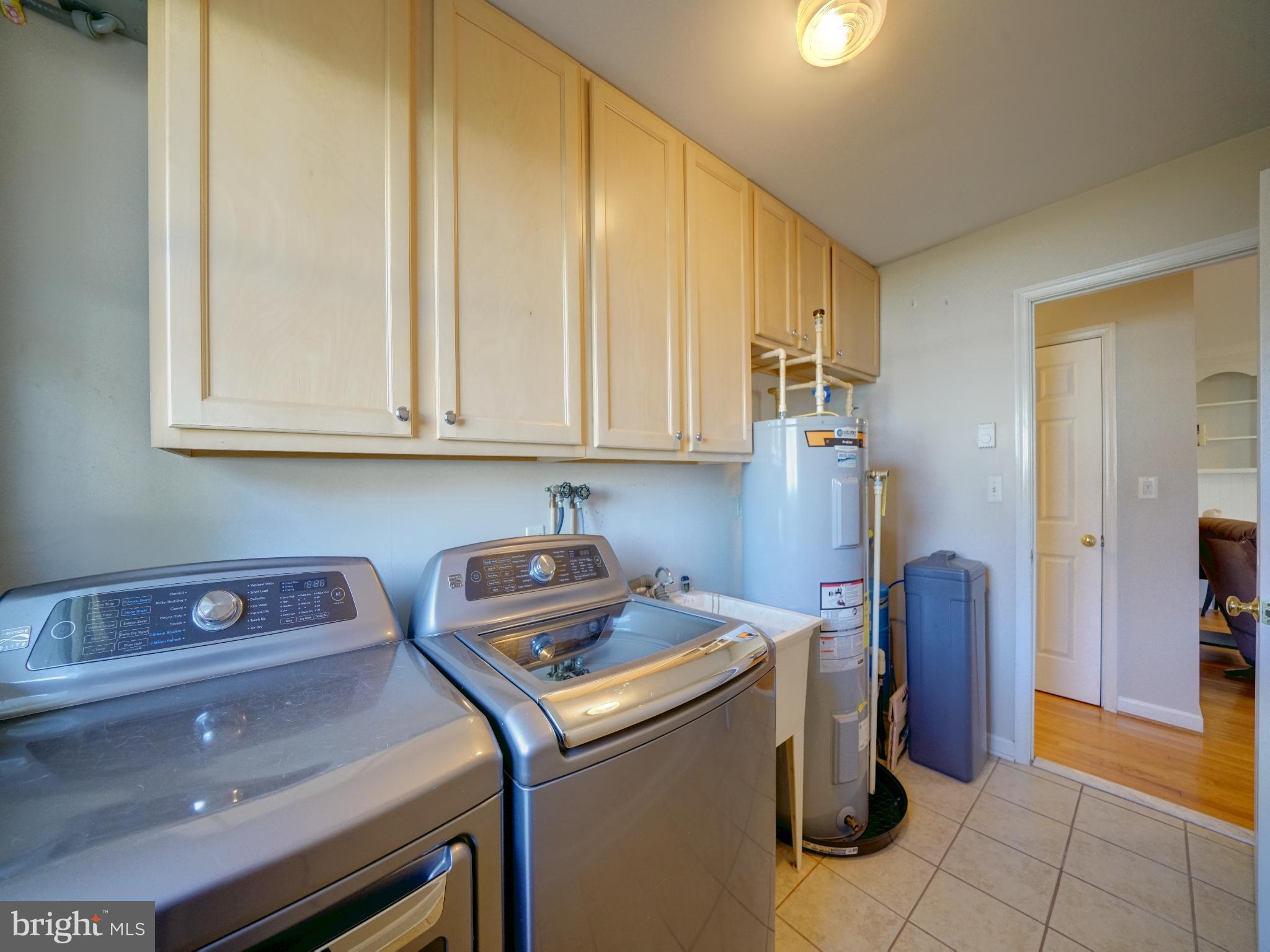 7819 Appletree Road Pasadena, MD 21122 - Photo 18 of 59 Bright and functional laundry space.