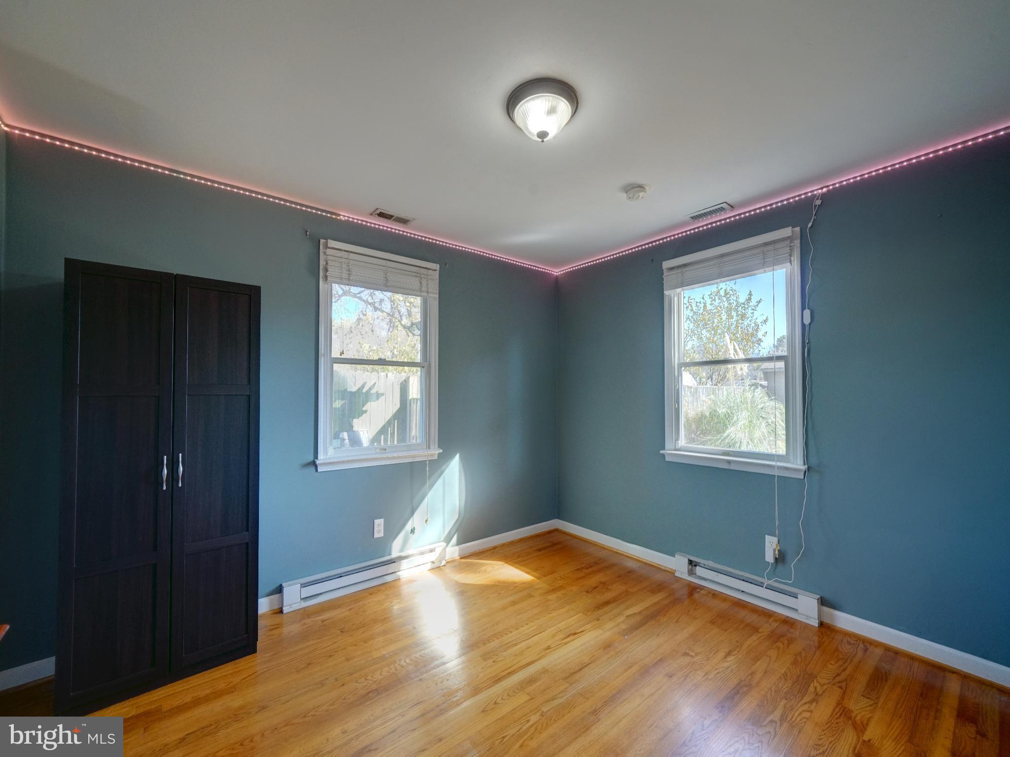 7819 Appletree Road Pasadena, MD 21122 - Photo 21 of 59 Bright, airy room with modern accents.