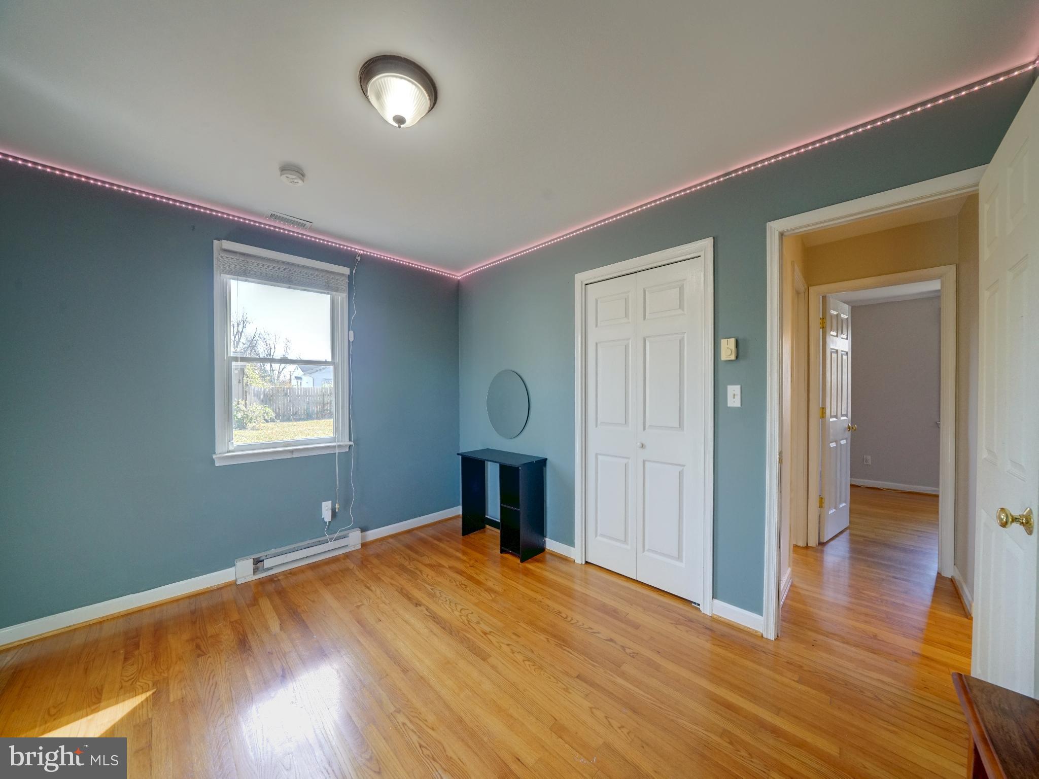 7819 Appletree Road Pasadena, MD 21122 - Photo 23 of 59 Bright and airy room with modern accents.