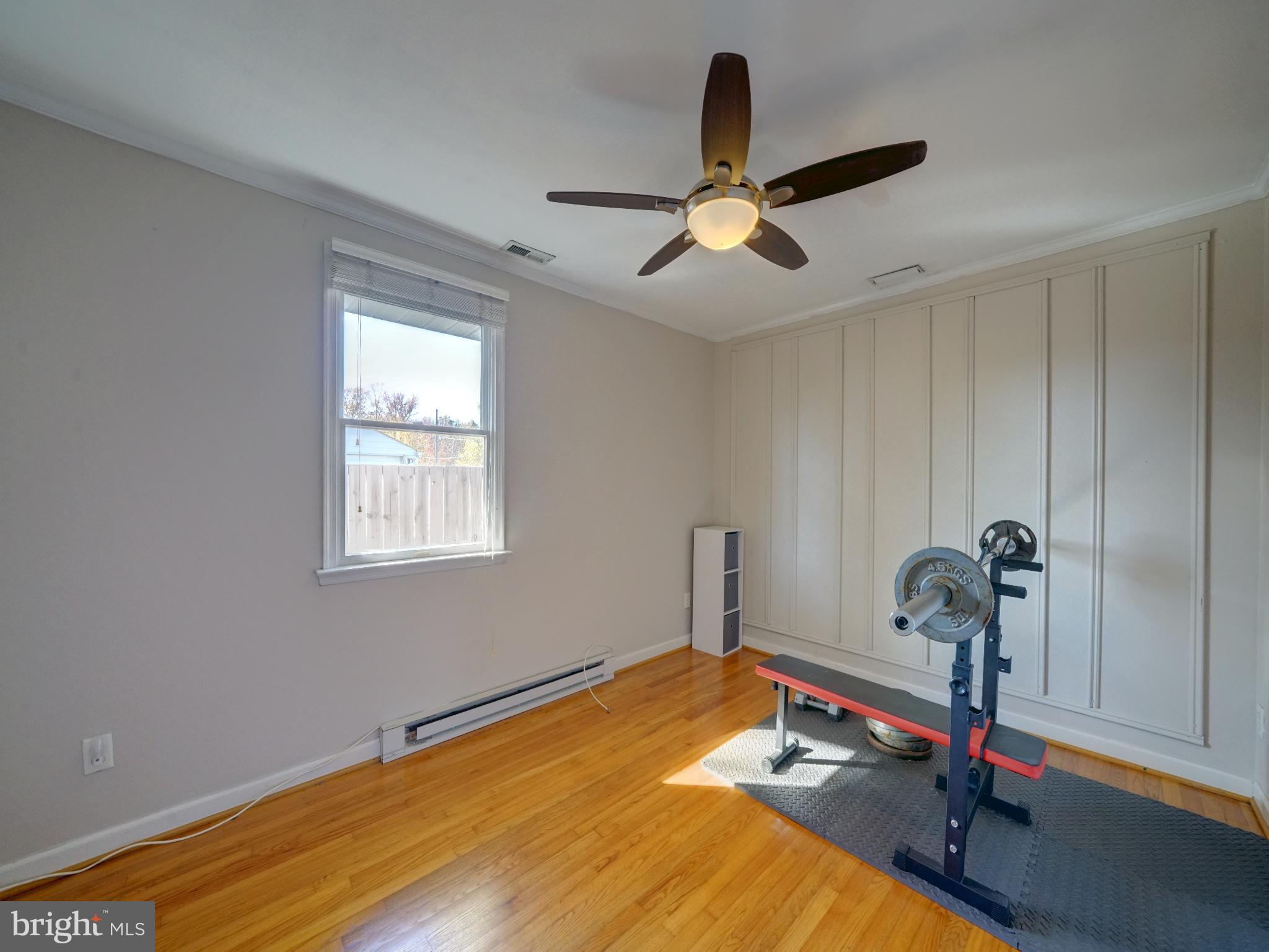 7819 Appletree Road Pasadena, MD 21122 - Photo 26 of 59 Bright and airy home gym space.