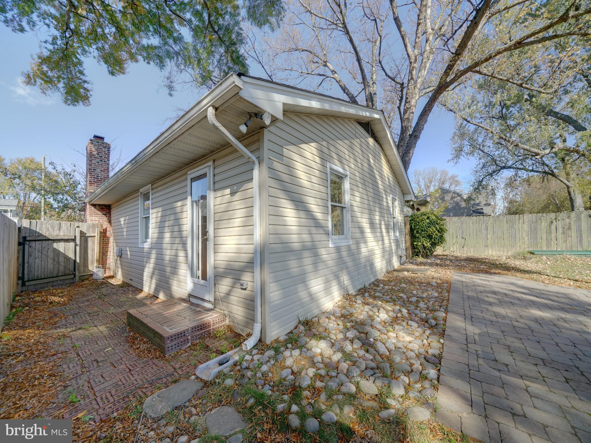 7819 Appletree Road Pasadena, MD 21122 - Photo 42 of 59 Charming home with serene outdoor space.
