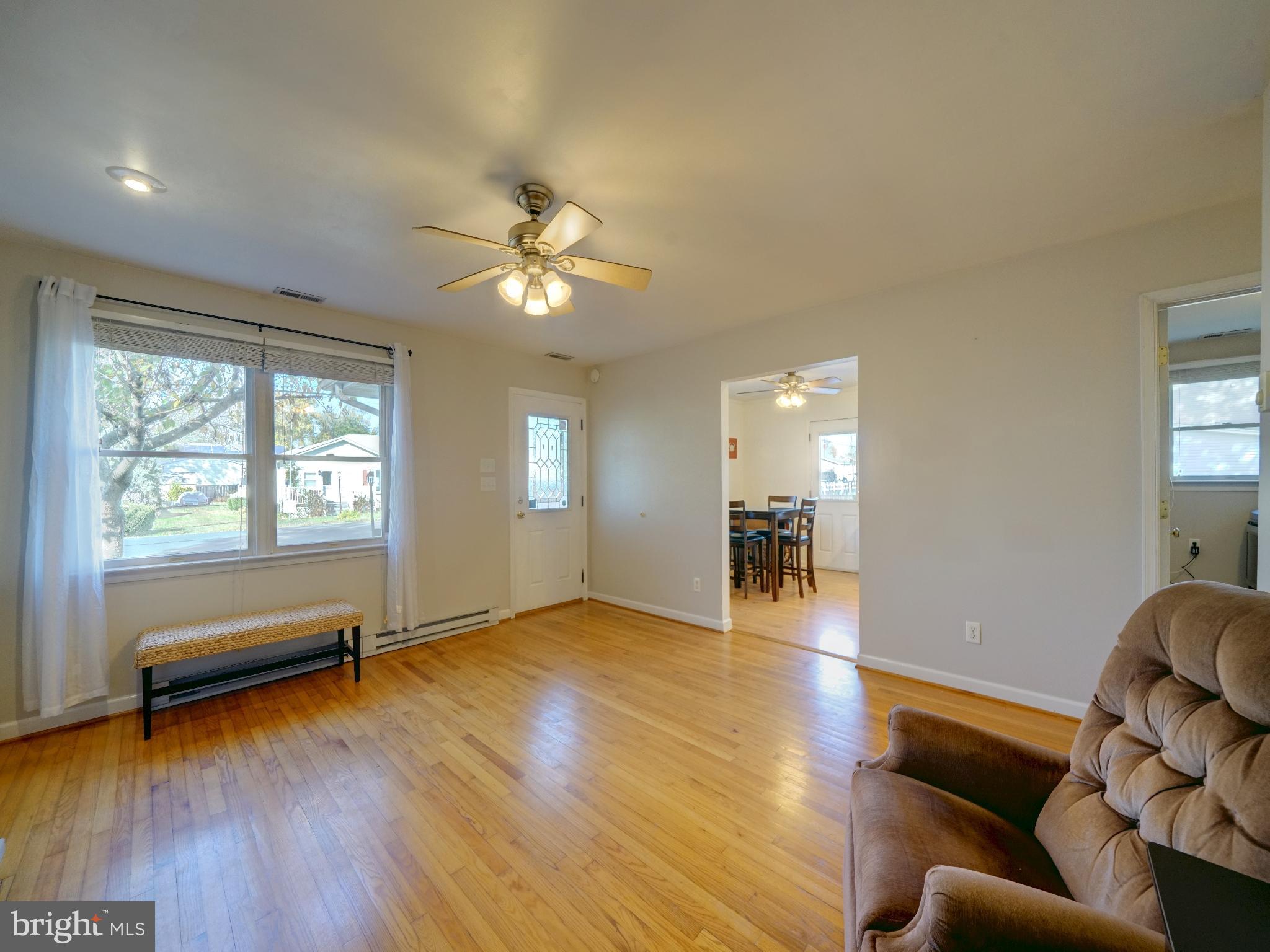 7819 Appletree Road Pasadena, MD 21122 - Photo 5 of 59 Bright and airy living space with natural light.