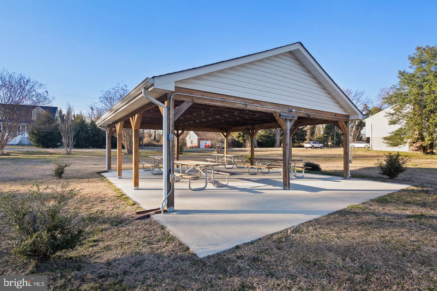 7819 Appletree Road Pasadena, MD 21122 - Photo 54 of 59 Spacious pavilion in a serene park setting.