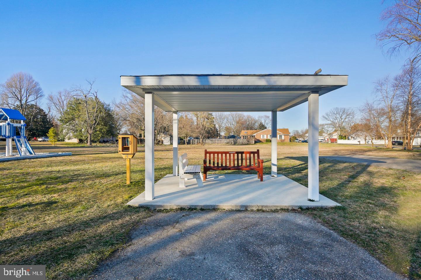 7819 Appletree Road Pasadena, MD 21122 - Photo 56 of 59 Inviting shelter in a serene park setting.