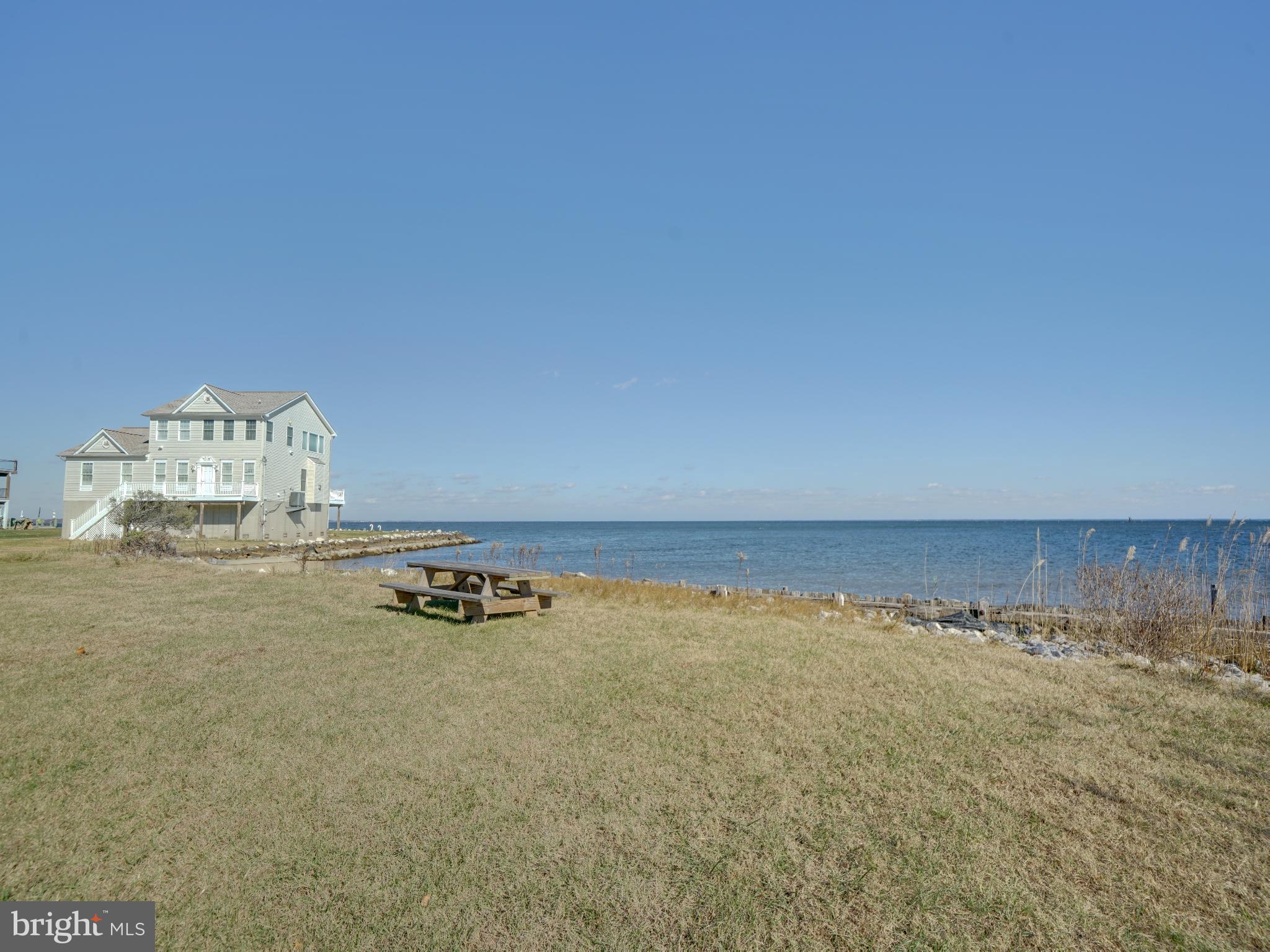 7819 Appletree Road Pasadena, MD 21122 - Photo 58 of 59 Serene waterfront retreat with endless views.