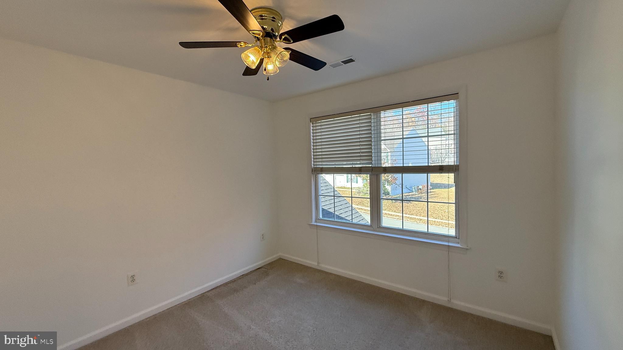 36 Tavern Road Stafford, VA 22554 - Photo 15 of 36 an empty room with windows and fan