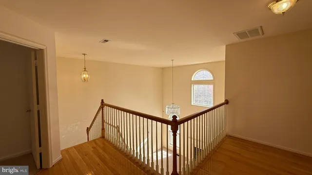 a bathroom with a double vanity sink toilet and shower