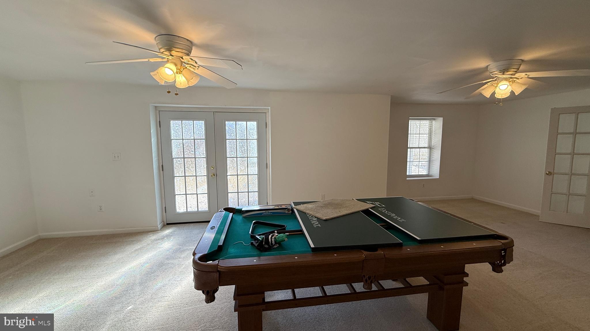 36 Tavern Road Stafford, VA 22554 - Photo 26 of 36 a living room with furniture and a chandelier