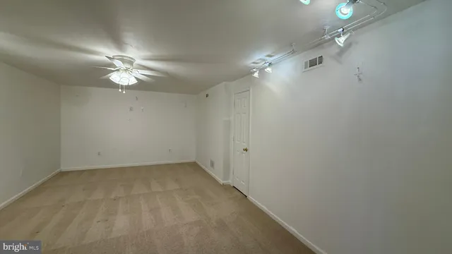 a view of an outdoor space with backyard of house