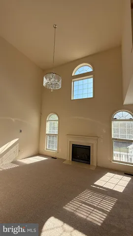 a view of entryway and hall with a window