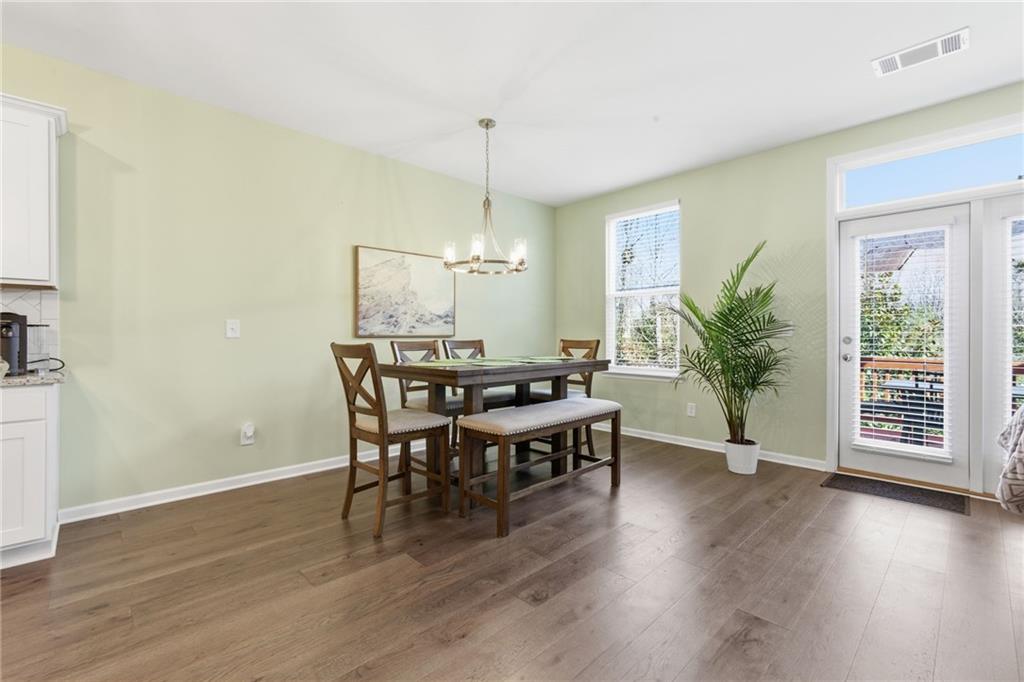 2106 Garden Place Atlanta, GA 30316 - Photo 15 of 37 a view of a dining room with furniture window and wooden floor