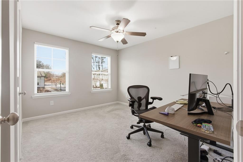 2106 Garden Place Atlanta, GA 30316 - Photo 27 of 37 a view of a workspace with furniture and a window