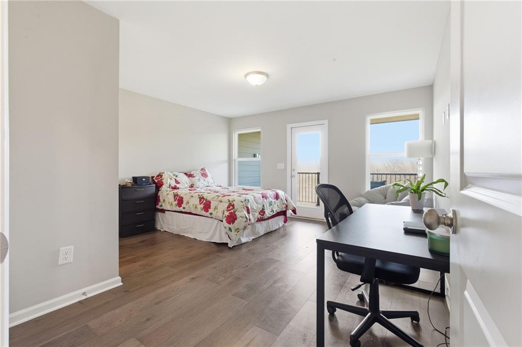 2106 Garden Place Atlanta, GA 30316 - Photo 31 of 37 a bedroom with a bed and a table