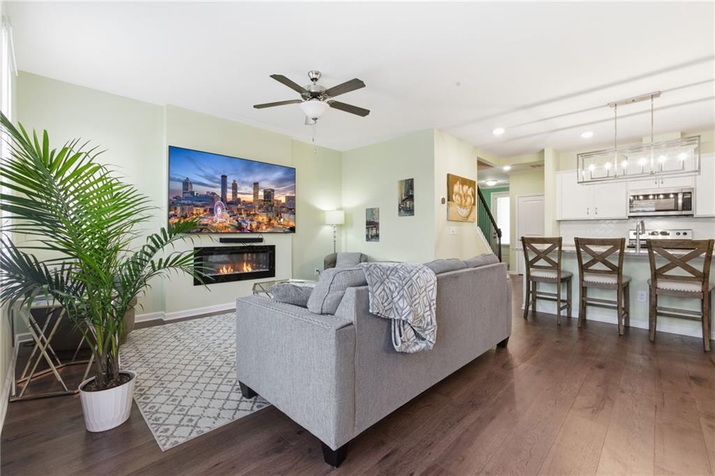 2106 Garden Place Atlanta, GA 30316 - Photo 5 of 37 a living room with furniture and a wooden floor