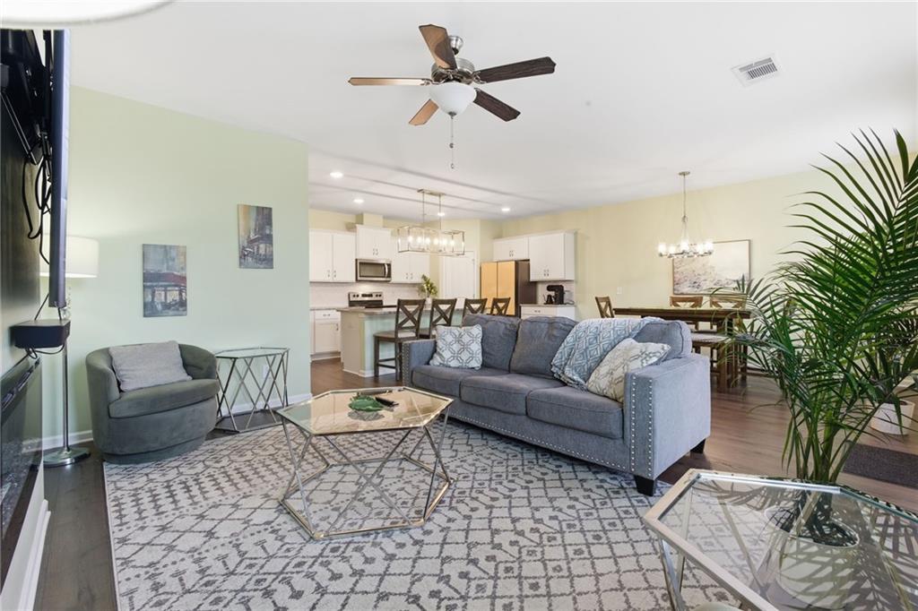 2106 Garden Place Atlanta, GA 30316 - Photo 8 of 37 a living room with furniture and a potted plant