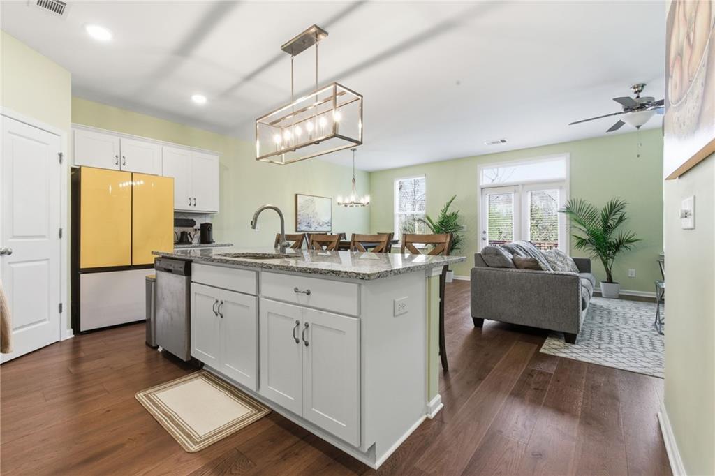 2106 Garden Place Atlanta, GA 30316 - Photo 9 of 37 a spacious bathroom with a double vanity sink a mirror and a bathtub