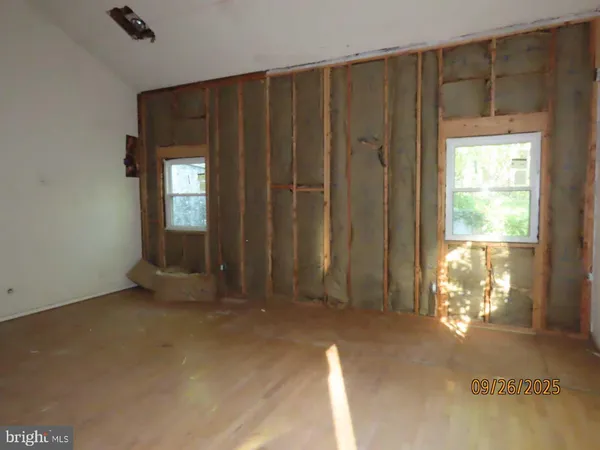 an empty room with windows