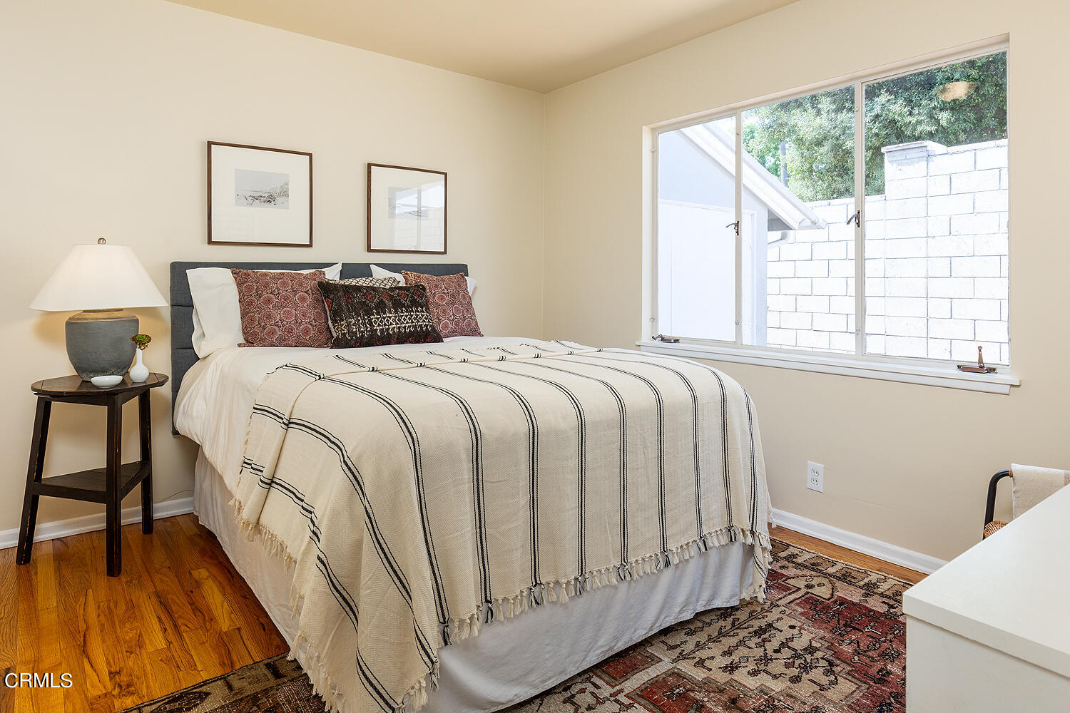 4176 Canyon Crest Road Altadena, CA 91001 - Photo 16 of 33 a bedroom with a bed and a window