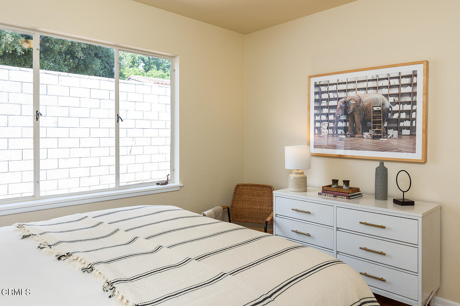 4176 Canyon Crest Road Altadena, CA 91001 - Photo 17 of 33 a bedroom with a bed and a window